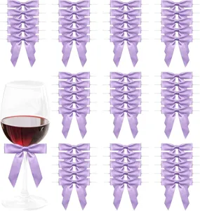 Purple satin ribbon bows detail view, perfect for gift packaging, party decor and DIY crafts.