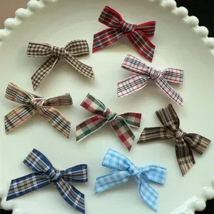 Sweet plaid ribbon bow hair clips set, cute tartan hairpins for women and girls daily styling.