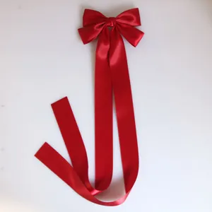 Large red satin long ribbon bow hair clip, sweet Korean style cute hair accessory for women.