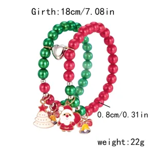 Vue détaillée montrant les dimensions des bracelets de Noël avec breloques Père Noël
