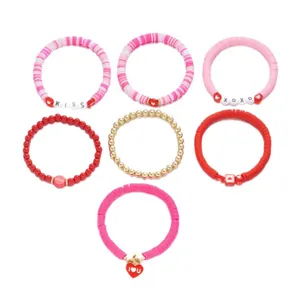 7-delige Valentijnsdag armbandenset met roze polymeerklei kralen en goud