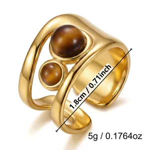 Close-up of vintage gold stainless steel ring with brown tiger eye stones and dimensions