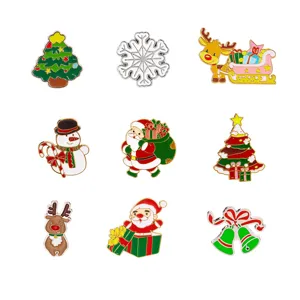 Detailed view of nine festive Christmas enamel brooches featuring Santa and trees.