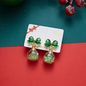 Festive Christmas bow earrings with green glitter and transparent glass ball beads