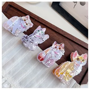 Adorable cartoon cat hair claws made of pearlescent acetate for versatile hairstyles.