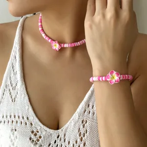 Handgefertigtes Set aus Halskette und Armband mit rosa Blumen aus Fimo für Damen
