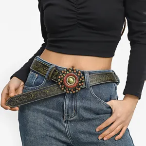 Close-up of Western cowboy embossed leather belt with retro gold punk buckle