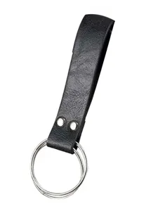 Detail view of a black medieval steampunk PU leather belt loop with large silver ring