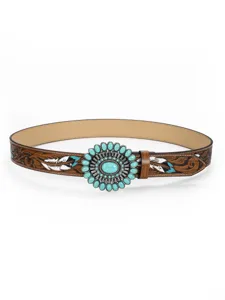 Detail view of vintage Western leather belt with turquoise floral buckle and ethnic carving