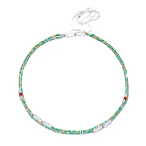 High-quality close-up of Bohemian layered colorful seed bead waist chain with cord