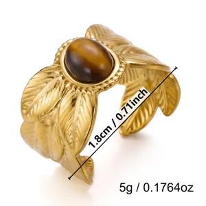 Detailed view of vintage tiger eye stainless steel ring with size and weight info.