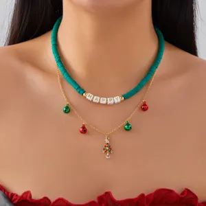 Detailed view of Christmas double-layer necklace with clay beads and bells