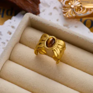 Vintage gold-plated stainless steel ring featuring a tiger eye stone and leaf textures