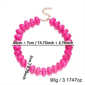Dimensional details of pink resin beaded Bohemian style necklace with weight