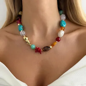 Close-up of bohemian colorful resin beaded necklace on model, vibrant summer accessory jewelry.