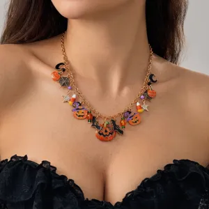 Detailed macro view of a Halloween theme necklace featuring pumpkin, bat and spider charms
