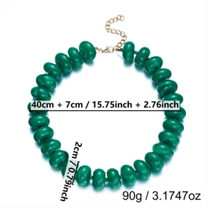Detail view of green resin beaded necklace dimensions: 40cm+7cm length and 2cm beads.