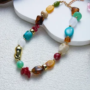 Detail shot of a vibrant colorful irregular resin beaded necklace clavicle chain