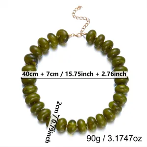Detailed view of green resin beaded necklace with length and weight measurements