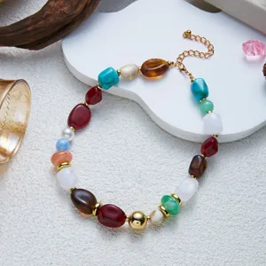 Detailed shot of colorful irregular resin bead necklace with marbled effect design