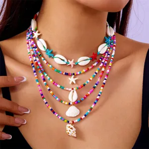 Close-up detail shot of a multi-layer boho shell and colorful bead choker necklace set.
