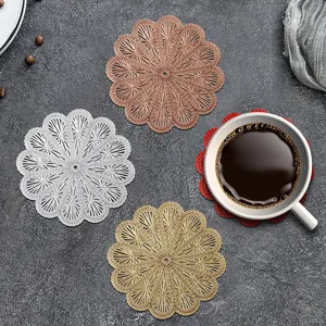 Round hollow flower PVC coasters set, heat-insulating table mats for coffee and tea cups.