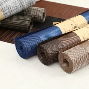 Detailed close-up of rolled woven placemats featuring textured mesh design in assorted colors.