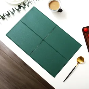Dark green leather placemat detail, featuring chic grid stitching and nice Nordic style.