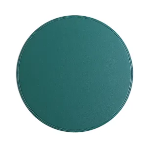 Round dark green leather placemat detail, fine stitch edges, waterproof and heat insulation pad.