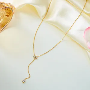 Elegant gold Y-shaped stainless steel necklace with zircon flower and teardrop pendant.