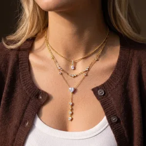 Elegant gold stainless steel layered necklace set with heart and teardrop CZ pendants