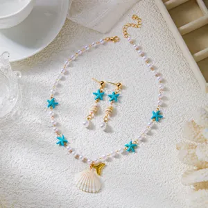 Elegante set di gioielli con conchiglie e stelle marine per vacanze estive al mare