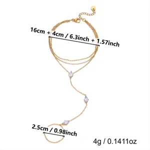 Détail du bracelet bague en acier doré avec zircones marquises bleues et ses dimensions