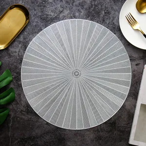 Runde hohle PVC Tischset mit elegantem strahlendem Muster, hitzebeständige Tischmatte.