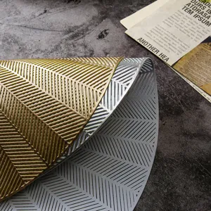 Hohles PVC bronziertes Tischset Detail, gold und silber Fischgrätenmuster Isoliermatte