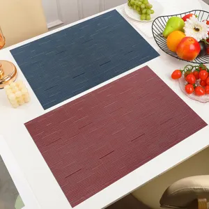 Durable PVC placemats for dining table, heat-resistant waterproof table mat sets.