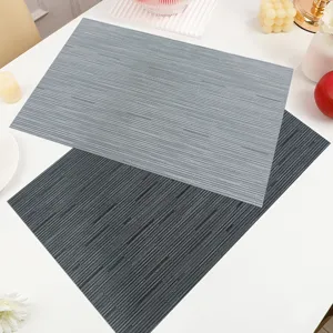 PVC woven placemat heat resistant waterproof dining table mat overhead view grey two pieces