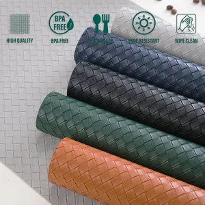 Premium woven PU leather placemat waterproof heat resistant table mat set for home dining.