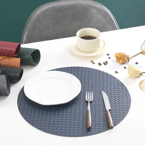 Round leather placemat detail, European style waterproof and heat insulation table mat for dining room.