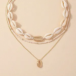 Bohemian multi-layer shell necklace set with white cowrie and gold beads for women