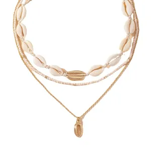 Bohemian stylish multi-layer shell and rice bead necklace set with golden pendant