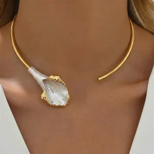 Detailed view of elegant gold-toned open choker with a white calla lily flower charm.