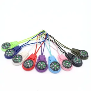 Boussole de poche portable multicolore avec cordon pour la randonnee en plein air.