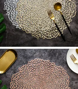 Close-up detail shot of hollow round placemats with delicate metallic finish, table decor.