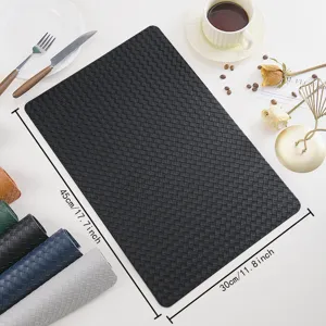Black woven PU leather placemat, waterproof heat insulation table mat for dining room.