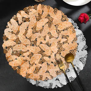 Round hollow butterfly PVC placemat heat insulation table mat elegant dining decor.