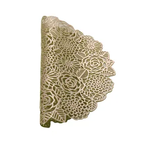 Detail view of gold hollow floral PVC table placemat, elegant dining room decor accent