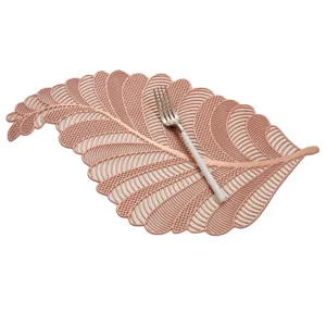 Exquisite hollow leaf shaped PVC placemat detail, metallic rose gold dining table decor heat insulated
