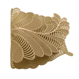 Gold hollow PVC placemat, exquisite leaf pattern heat resistant dining table mat detail view.