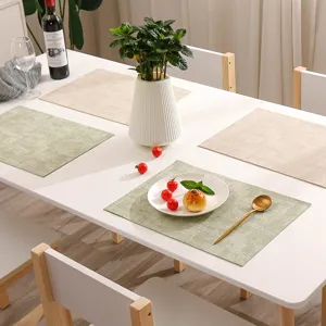 Minimalist rectangular double-sided PU leather placemat for dining table, waterproof and heat-resistant.